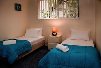 Champelli Palms - Goulburn Accommodation 6